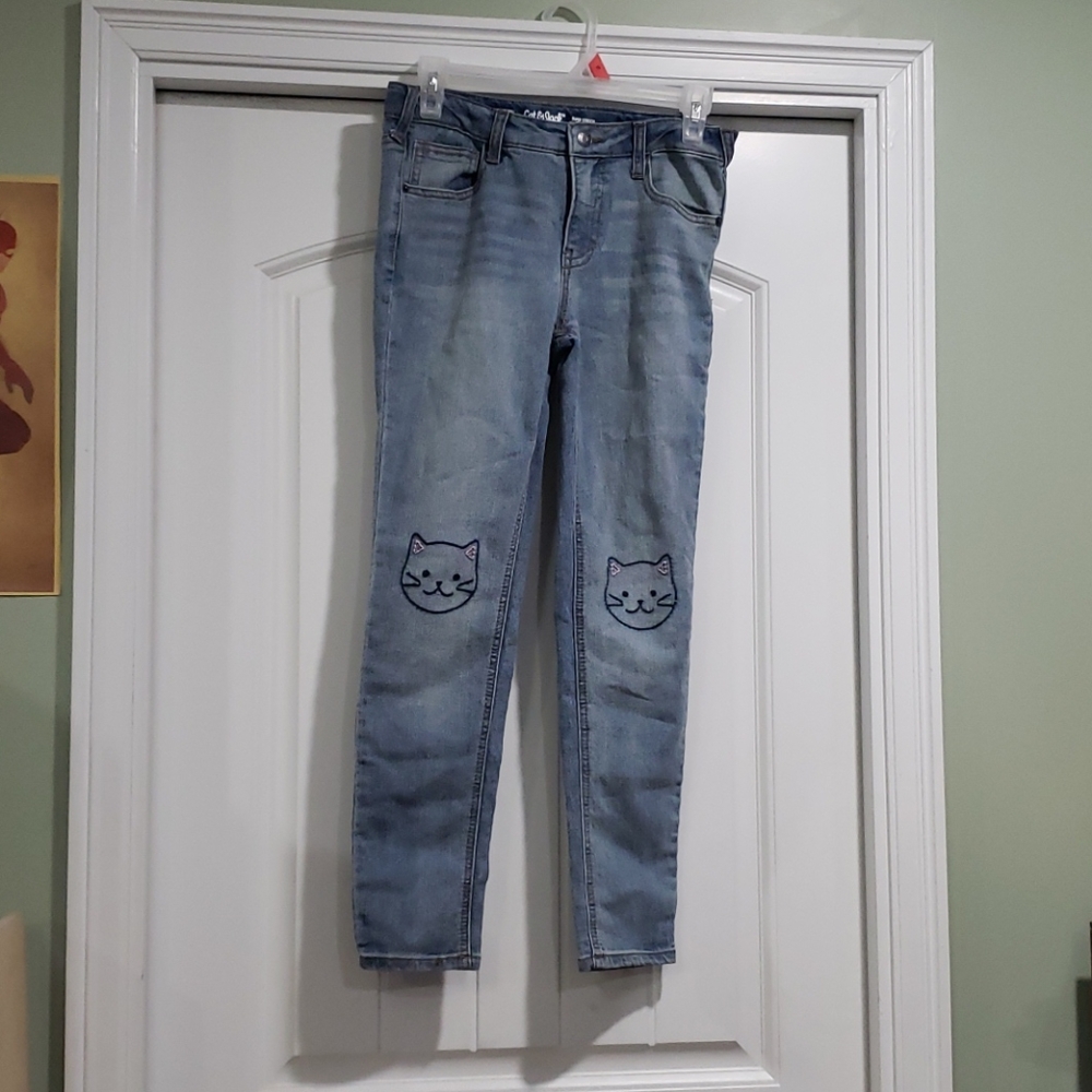 Skinny jeans w/ cats on them